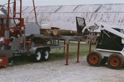 PRO-HD firewood processor with hydraulic chainsaw, top-roll, live deck