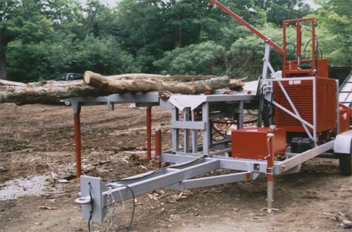 PRO-HD firewood processor with hydraulic chainsaw, top-roll, live deck